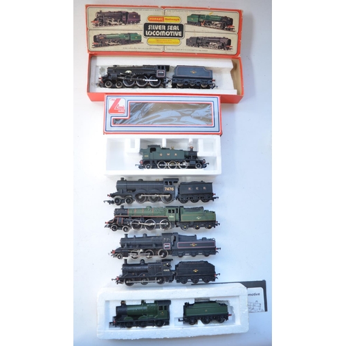 77 - Collection of 7 well used OO gauge electric steam train models from Hornby, Lima, Mainline and Tri-A... 