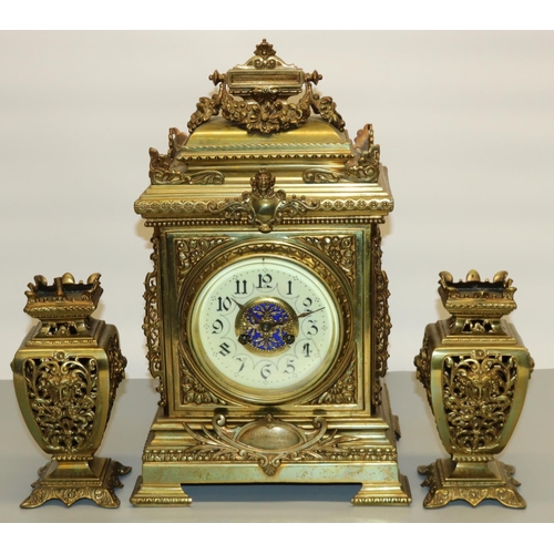 1435 - F. Marti, late 19th century brass presentation three-piece  clock garniture, cream Arabic dial, cast... 