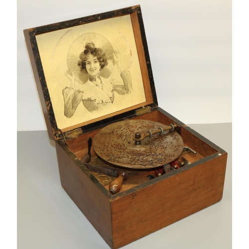 1292 - Victorian walnut cased Symphonion disc music box, paper label to the inside of the box, W25.8cm D22.... 