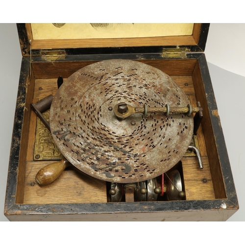 1292 - Victorian walnut cased Symphonion disc music box, paper label to the inside of the box, W25.8cm D22.... 