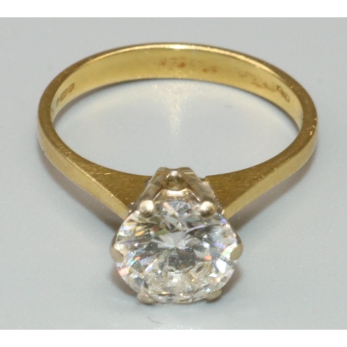 1003 - 18ct yellow gold diamond solitaire ring, the brilliant cut diamond in tiffany setting on tapered sho... 