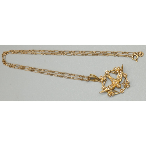 1030 - 18ct yellow gold Edwardian swallow pendant set with seed pearls, stamped 18k with worn hallmarks, on... 