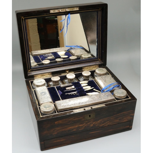 1240 - Victorian coromandel vanity case, fitted interior with ten engraved and initialled silver topped cle... 