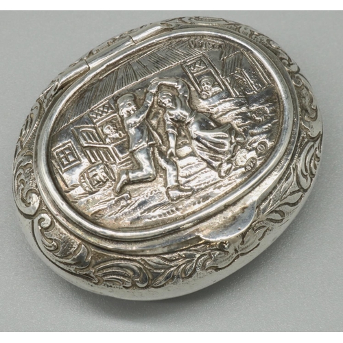 1178 - Continental silver oval basket shaped snuff box, hinged lid repousse decorated with dancing figures,... 