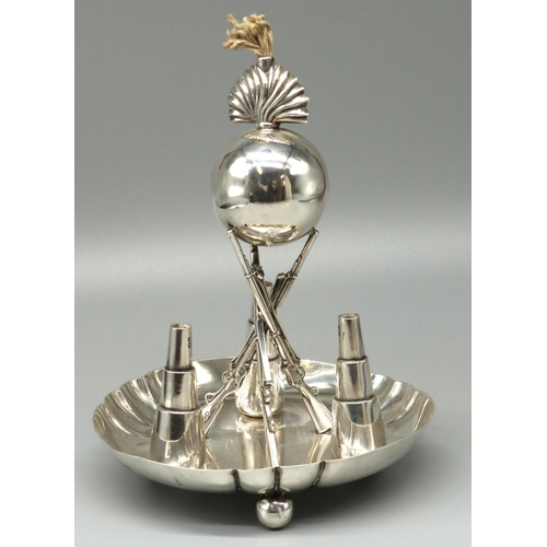 1068 - Victorian hallmarked silver Mess table lighter, with ball grenade on three crossed rifle supports an... 