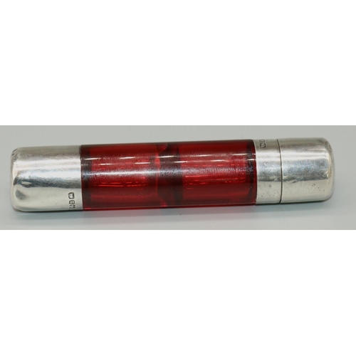 1155 - Victorian hallmarked silver mounted double end red glass scent bottle, with hinged and screw covers,... 