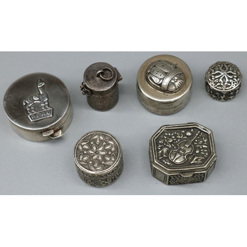 1151 - Collection of seven continental shaped pill boxes with Peru, scarab violin and other decoration, all... 