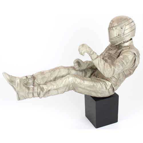 1286 - Paul Oz (British Contemporary); Ayrton Senna at Eau Rouge Spa, a 1/5th scale silvered resin model of... 