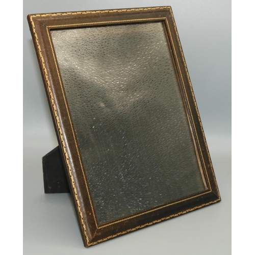 1247 - Harrods Ltd. brown leather rectangular easel photo frame, with gilt border, H26cm W21cm