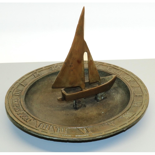 1287 - C20th patinated cast metal circular sundial, Roman numeral border with boat gnomon, D31cm H24cm