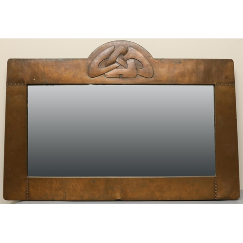 1385 - Archibald Knox for Liberty and Co. hammered copper wall mirror, Celtic knot cresting in riveted angu... 