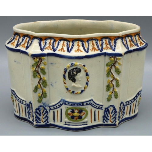 1221 - C19th Prattware shaped oval tea caddy, relief decorated with anthemion and portrait medallion, W13cm