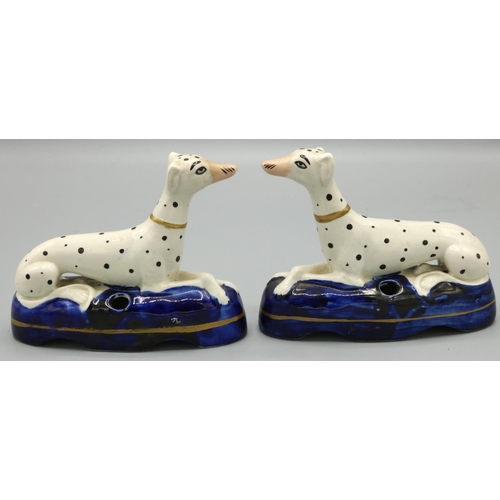 1220 - Pair of Staffordshire Dalmatian pen holders, on gilt lined blue bases, L12cm H9cm (2)