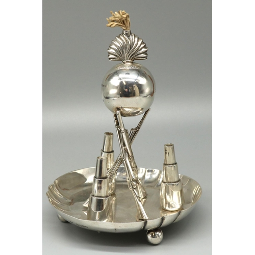 1068 - Victorian hallmarked silver Mess table lighter, with ball grenade on three crossed rifle supports an... 