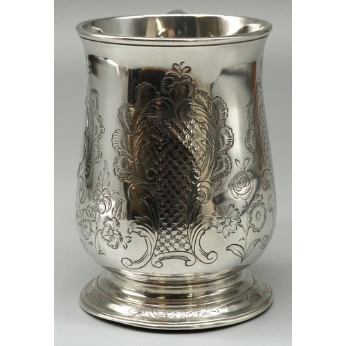 1096 - George III hallmarked silver mug, baluster body decorated with foliage scrolls and vacant cartouche,... 