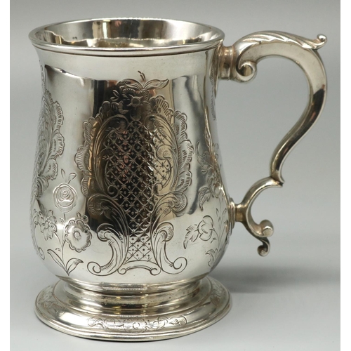 1096 - George III hallmarked silver mug, baluster body decorated with foliage scrolls and vacant cartouche,... 