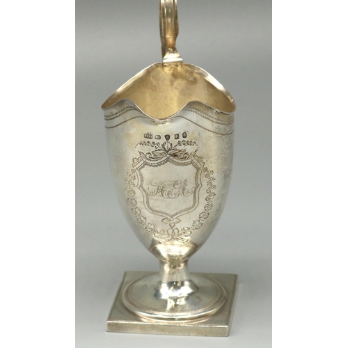 1112 - George III hallmarked silver helmet shaped pedestal cream jug, with dot prick and bright cut decorat... 