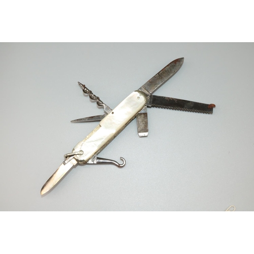 1242 - Large early C20th Underwood of London utility knife with two blades, saw. file, screwdriver, spike, ... 