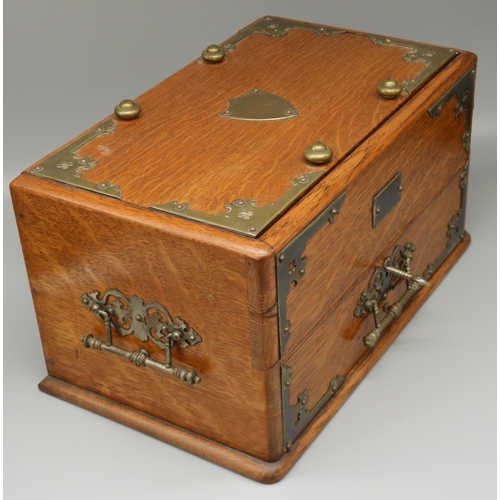 1277 - Edwardian brass bound oak smokers cabinet, hinged lid with cedar liner interior above a fitted drawe... 