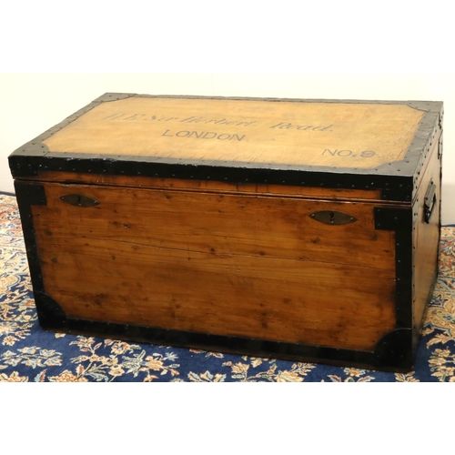 1396 - Sir Herbert Read - a metal bound pine travel trunk, with tin lined interior and cast side carry hand... 