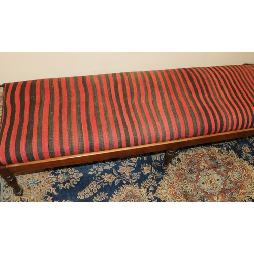 1403 - Large Victorian and later rectangular window seat, loose seat covered in striped kelim, on six facet... 