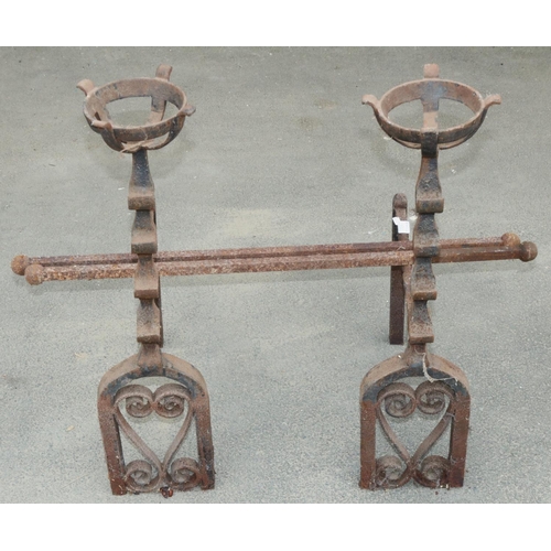 1455 - Pair of cast iron fire dogs, fire basket tops on curved openwork scrolled supports, H76cm (2)