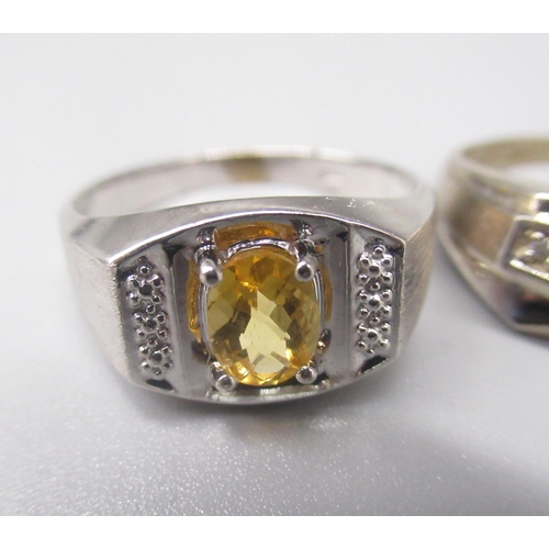 17 - 10ct white gold ring set with oval cut citrine, stamped 10k, size T1/2, and another 10k white gold r... 