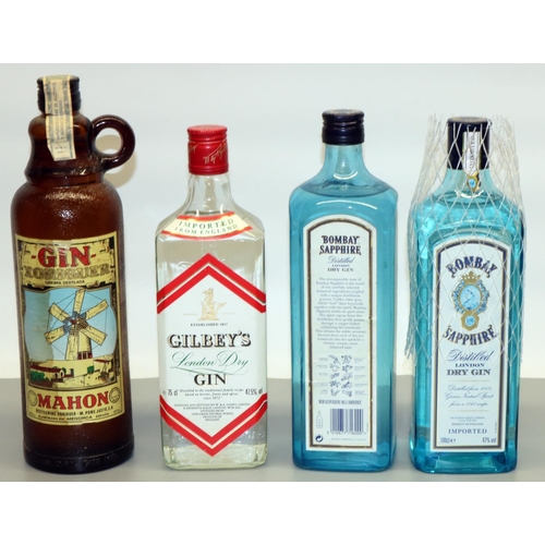 1323 - Two Bombay Sapphire Imported London Dry Gin. 47%vol 100cl. Gilby's Imported London Dry Gin, 47.5%vol... 