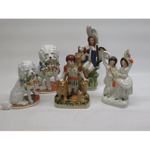 102 - Three Staffordshire style figures and two models of dogs with baskets of pigs (5)