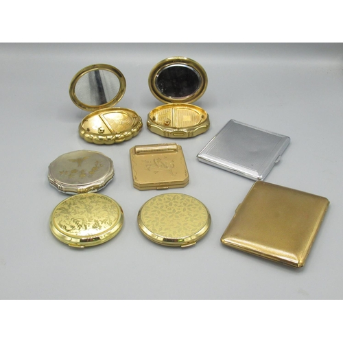 116 - Four C20th ladies compacts, 2 musical ladies compacts and 2 plated cigarette cases