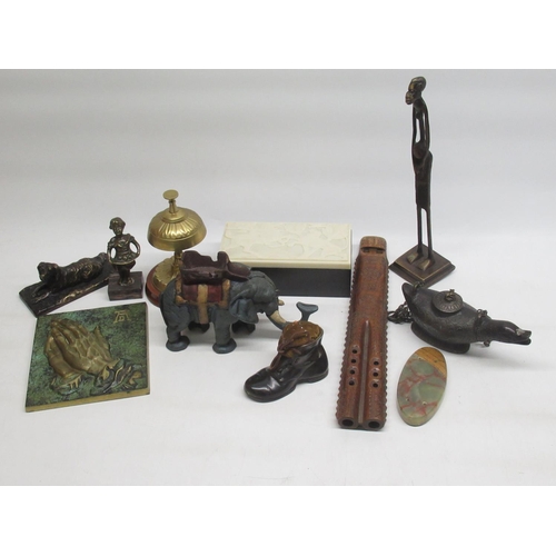 124 - C20th carved wood flute, cast metal elephant money box, C20th brass desk bell, etc.