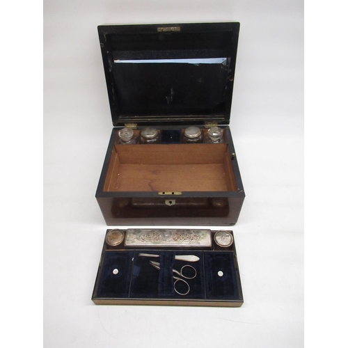 127 - Victorian walnut ladies vanity case, fitted interior with five silver plate topped clear glass bottl... 