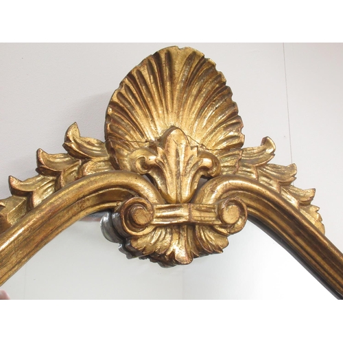 168 - C20th gilt framed mirror, with shell cresting W76cm  H108.5cm