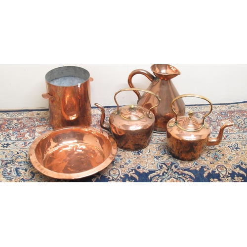 89 - Large copper water jug, two copper kettles, two handled pot and a large copper dish (5)