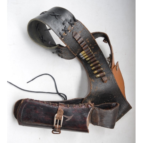 1502 - Replica Colt 45 Army single action revolver, leather gun holster with replica bullets, a hunting kni... 