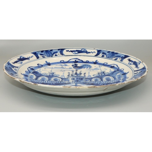 56 - Dom Joly Collection - Chinese porcelain tin glazed circular plate, decorated in blue and white  with... 