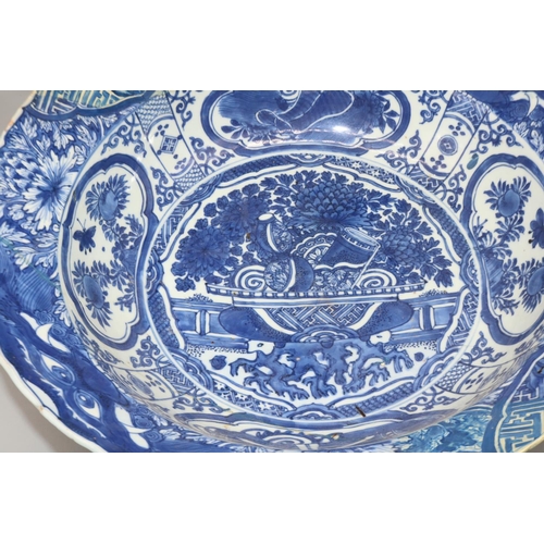 57 - Dom Joly Collection - Chinese porcelain circular bowl, decorated in blue and white with a vases in a... 