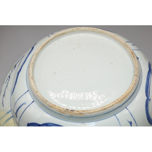 57 - Dom Joly Collection - Chinese porcelain circular bowl, decorated in blue and white with a vases in a... 