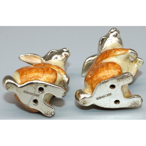 59 - Dom Joly Collection - Pair of Continental silver and enamel models of seated Rabbits, marked JAH 925... 