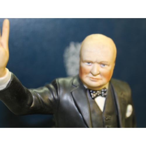 1058 - ASHMOR. Hand painted figure of Sir Winston Churchill giving his famous 'victory' salute. H28CM. In o... 