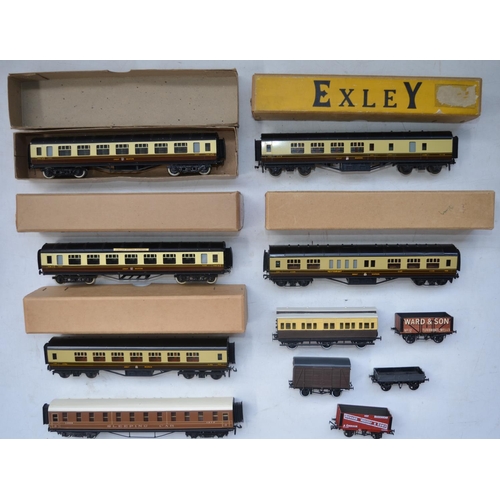 88 - Six all metal OO gauge Exley passenger coaches, a built up kit coach and 4 goods wagons (11)