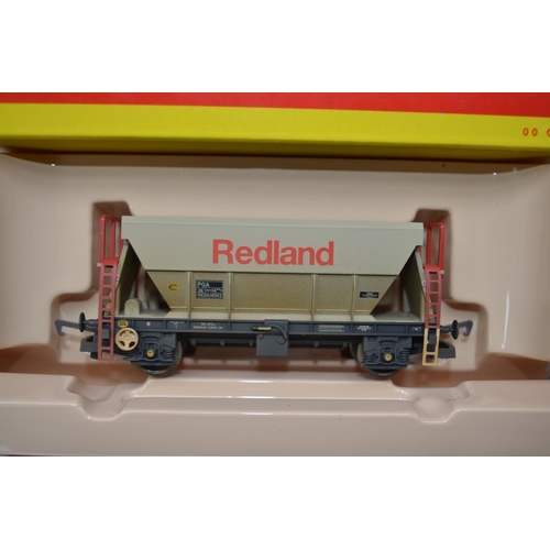 97 - Collection of boxed OO gauge goods wagons, various manufacturers to include Hornby, Dapol, Bachmann ... 