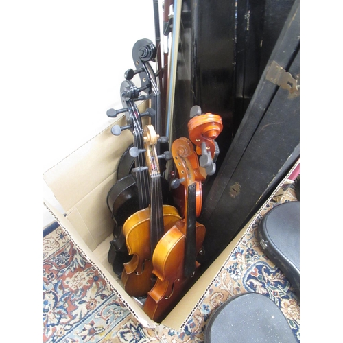 373 - Small group of violins and cases, in need of repair