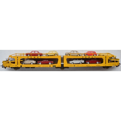 105 - Three boxed OO gauge railway rolling stock models to include Electrotren car transporter with Mini l... 