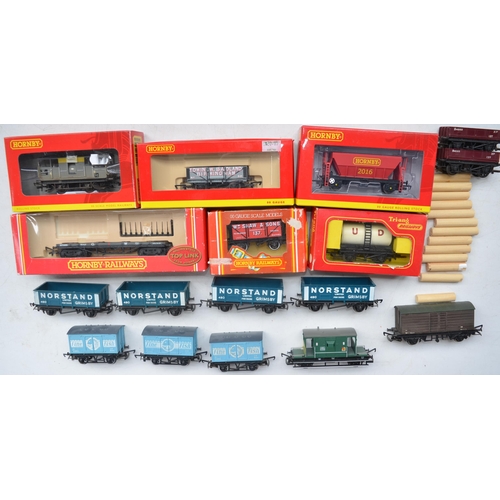 106 - Collection of OO gauge rolling stock, various manufacturers to include Hornby, Tri-Ang, Lima and Dap... 