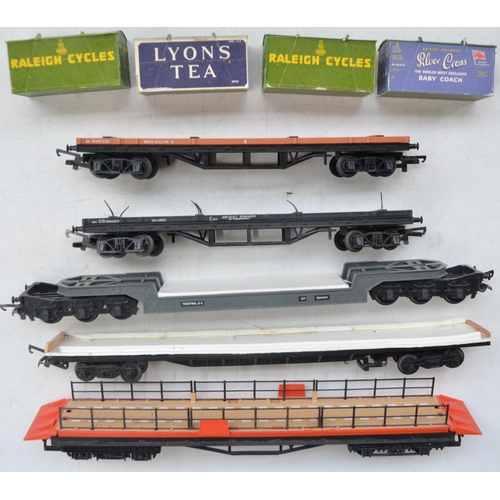 106 - Collection of OO gauge rolling stock, various manufacturers to include Hornby, Tri-Ang, Lima and Dap... 