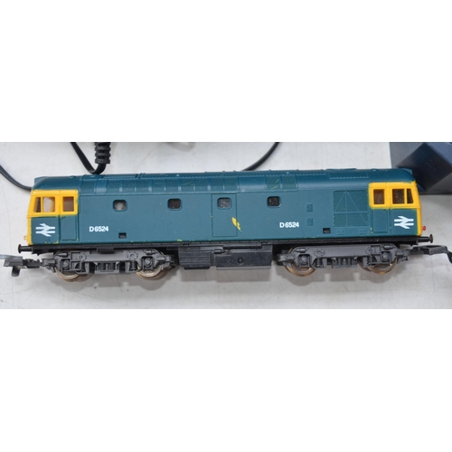 113 - Collection of used OO gauge railway models, track and 2 controllers and a collection of Action Man f... 