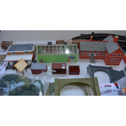 115 - Collection of OO gauge model railway, scenic accessories, buildings, track, controllers etc. 2 boxes