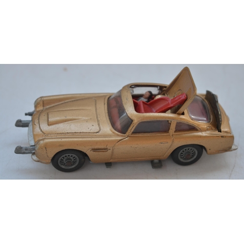 120 - Boxed Telsalda friction powered Ford Cortina estate, Tri-ang No2 Minic clockwork sports car, with or... 