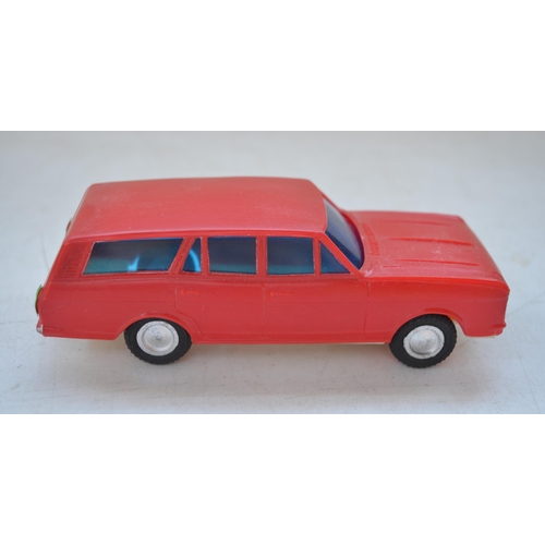 120 - Boxed Telsalda friction powered Ford Cortina estate, Tri-ang No2 Minic clockwork sports car, with or... 